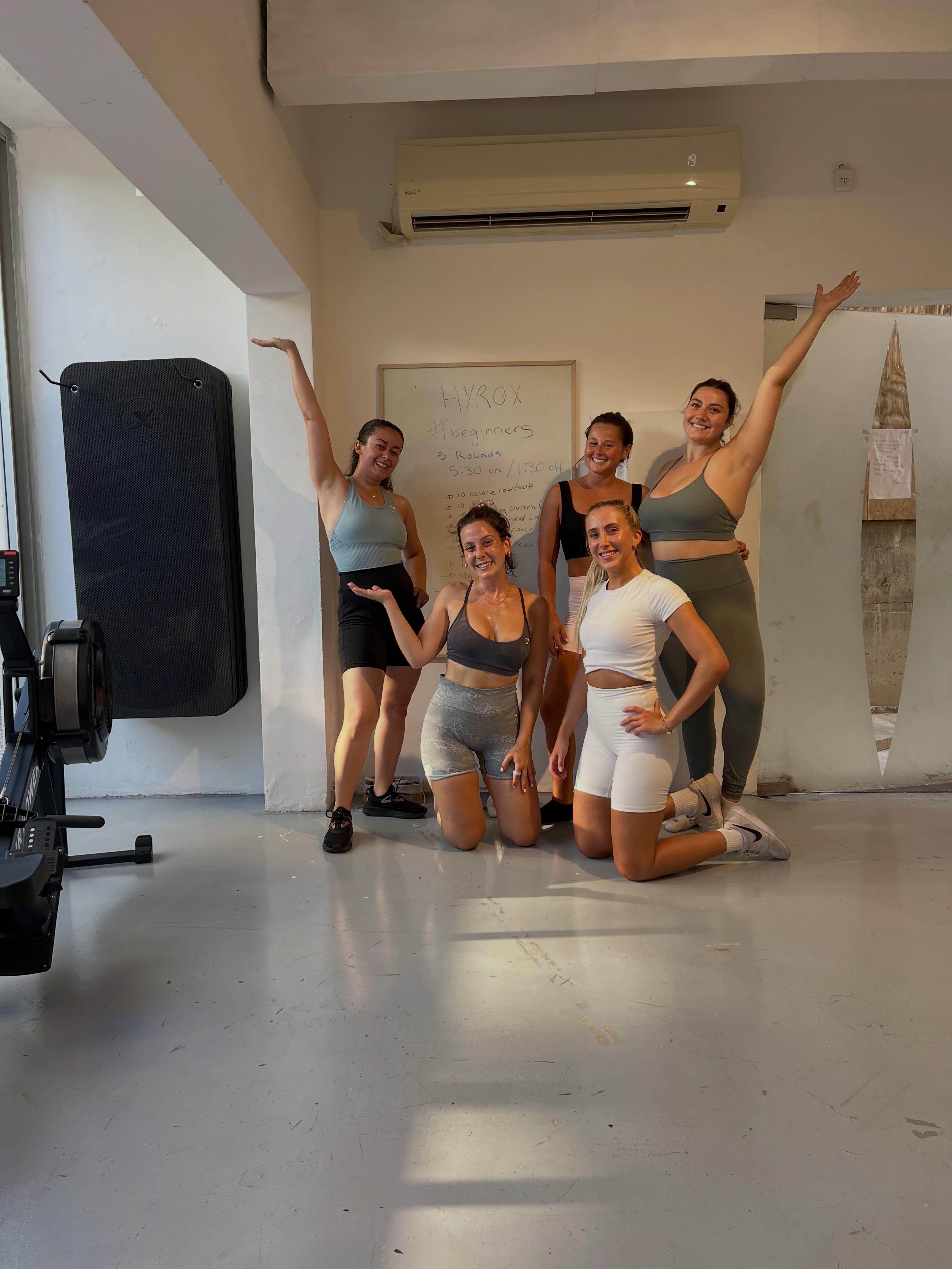 Group of women celebrating after a beginner workout session